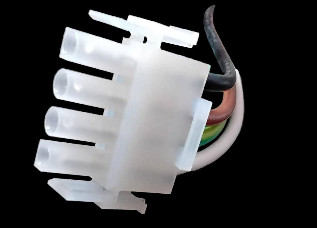 A close up view of the shape of the end of a white plastic wire harness connector on an aftermarket substitute for a Whirlpool W10884390 icemaker assembly. The wire colors are black, brown, green, white, from top to bottom. 